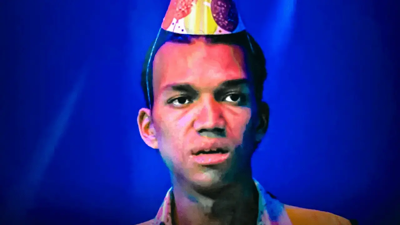 A24's I Saw the TV Glow depicts Owen wearing a birthday party hat.