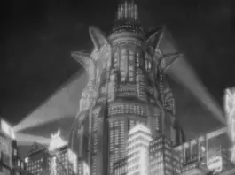 Metropolis rises into the sky lit by searchlights